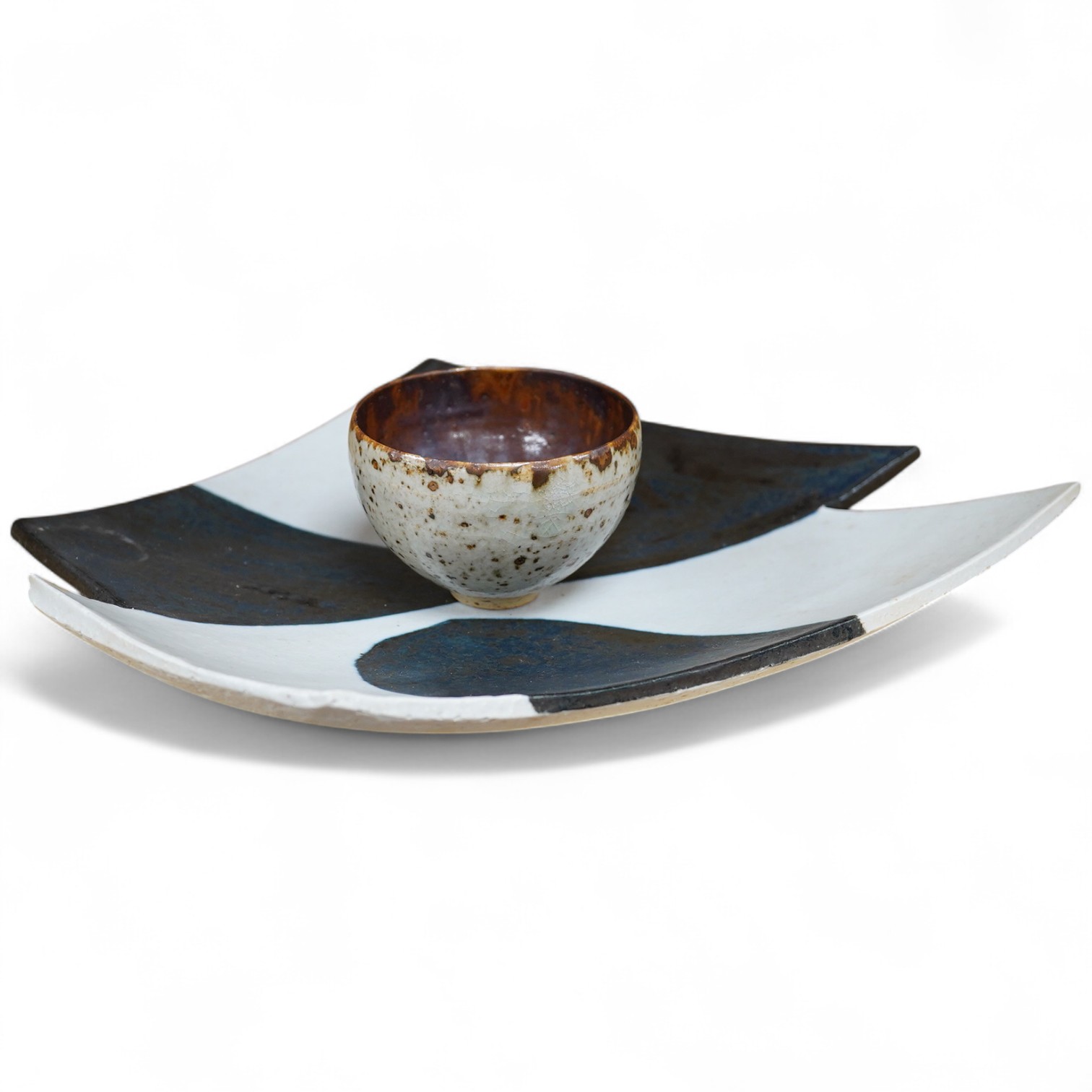 Derek Davis (1926–2008), an asymmetric dish and a small bowl, largest 31.5cm